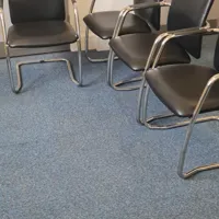 Four meeting room chairs